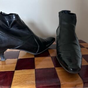 Franco Sarto Sleek Black Leather Ankle Booties.